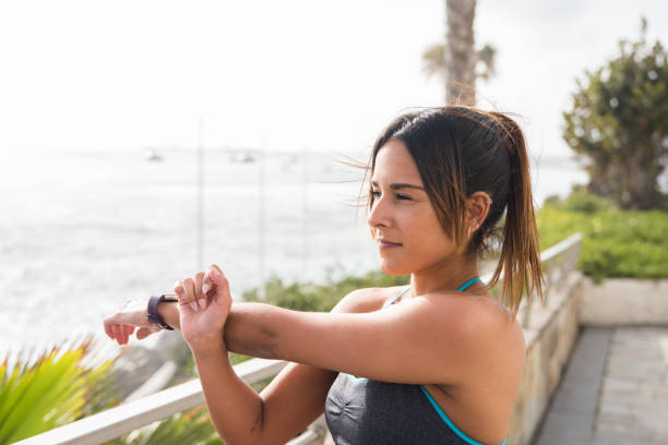 istock A young attractive woman exercising outside 955820208