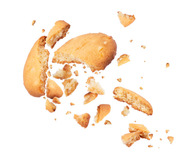 istock Biscuits crumbles into pieces close-up isolated on a white background 955824300