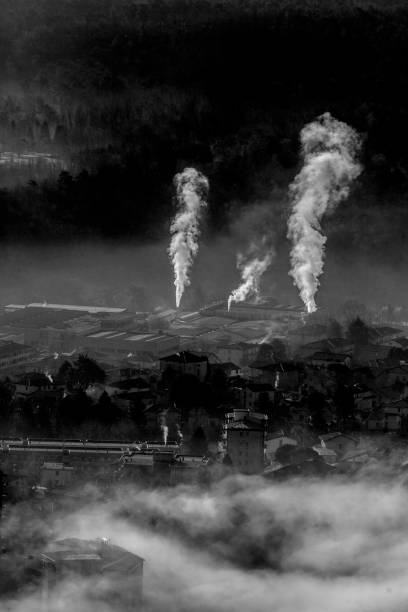 istock Smoke from industry in winter in black and white 955824880