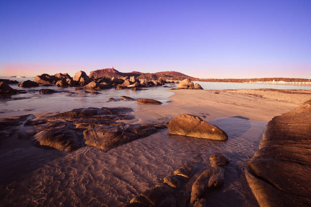 istock Low tide during sunrise on a beach of southern Sardinia. 955829080