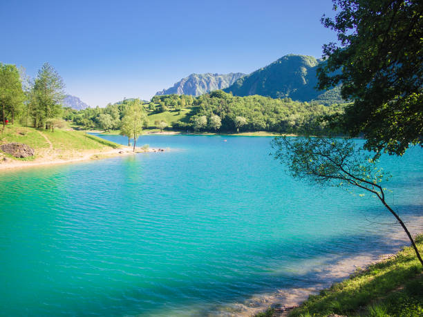 istock Lake Tenno surrounded by Italian alps. 955829150