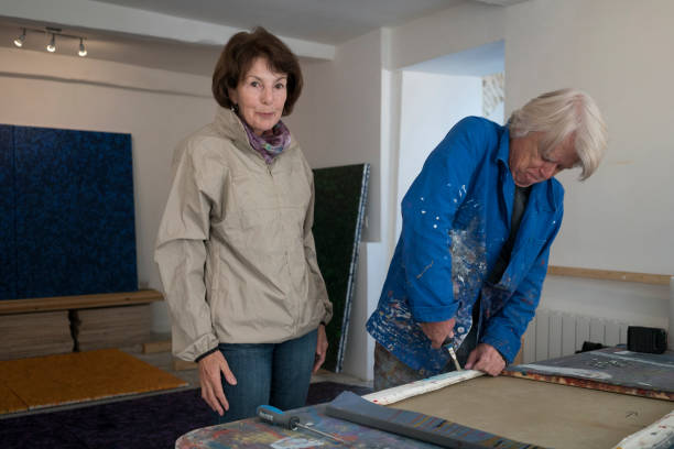 istock Baby boomers in the art studio 955831426