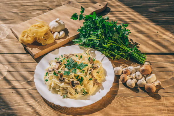 Creamy satisfying vegan meal. Pasta with roasted mushrooms.
