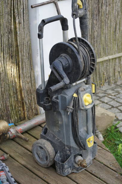 istock The pond maintenance. The high pressure cleaner... 955836386