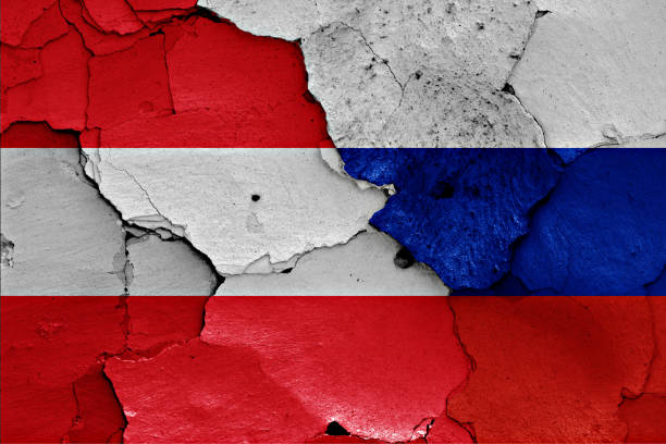 istock flags of Austria and Russia painted on cracked wall 955839946