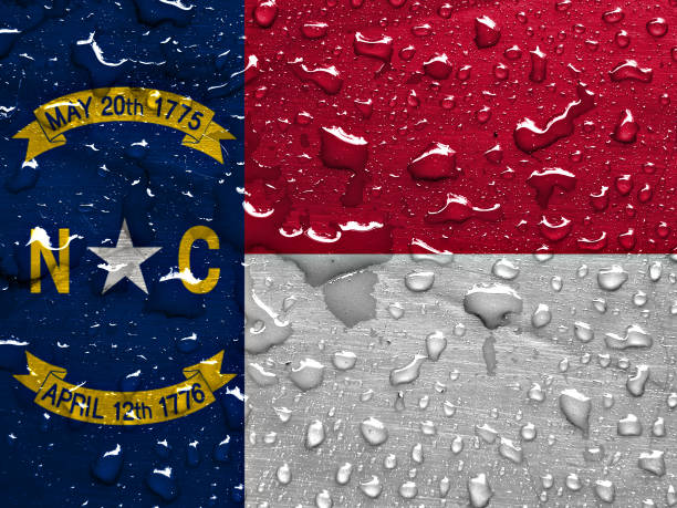 istock flag of North Carolina with rain drops 955840590