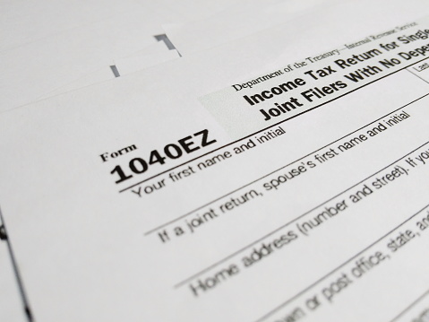 photo close up of usa tax form type 1040ez, income tax return for single and joint filers with no dependents