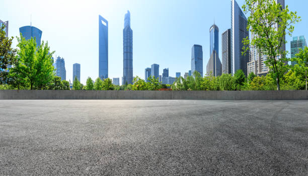 istock empty asphalt square with city skyline background in shanghai 955855242