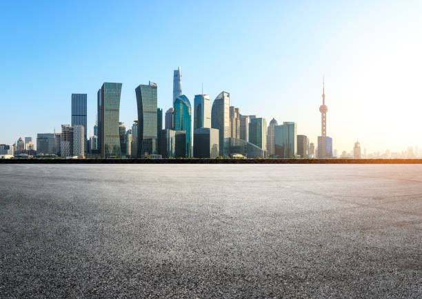 istock empty asphalt square and city skyline in shanghai at sunset 955855876