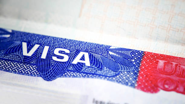 istock USA  visa logo in passport 955858144