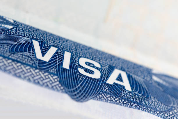 istock US american visa stamp in passport 955858170