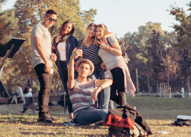 istock Group of Multiethnic Teenagers Taking a Selfie 955858268