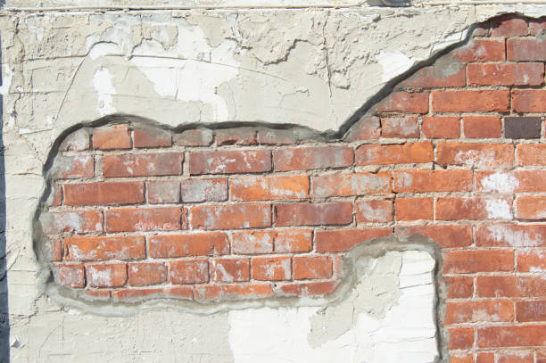 istock Brick and stucco wall detail 955869612