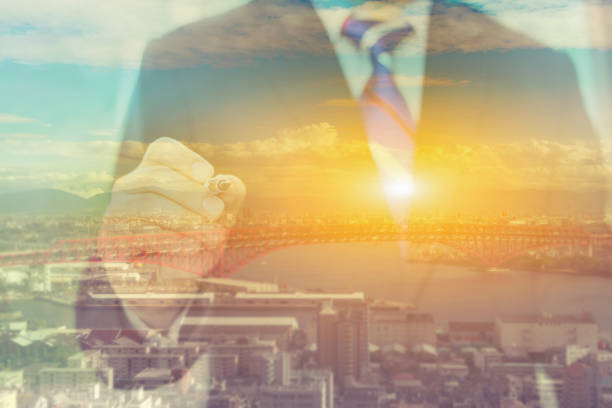 istock Hand drawing a stairs in a Conceptual Image  with a strategy plan to be successful in his business  growth and progress,vintage ,double exposure 955879582