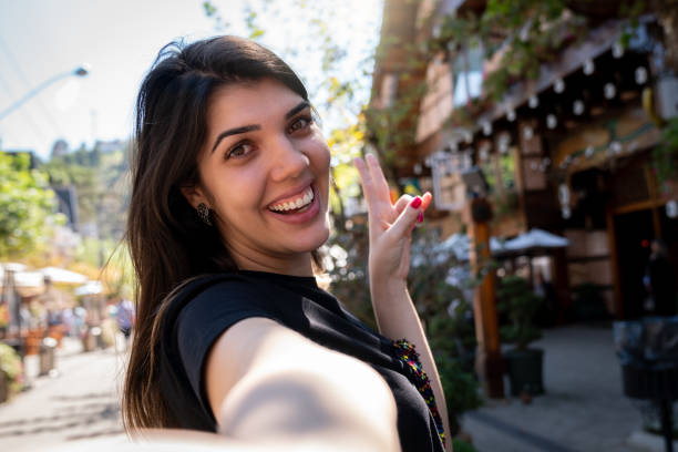 istock Woman taking a selfie in Small Germanic Village 955889578