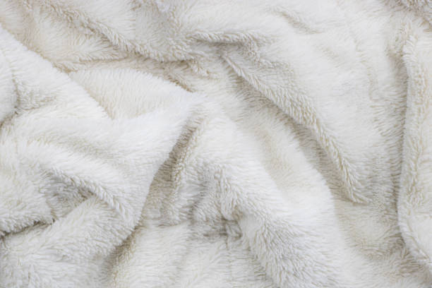 White fur blanket texture White faux fur blanket full frame fluffy blanket stock pictures, royalty-free photos & images