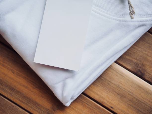 istock White round t-shirt and clothing label 955894630