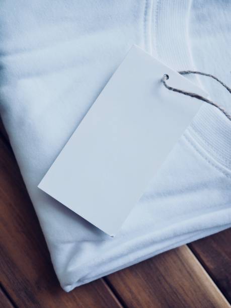 istock White round t-shirt and clothing label 955894636