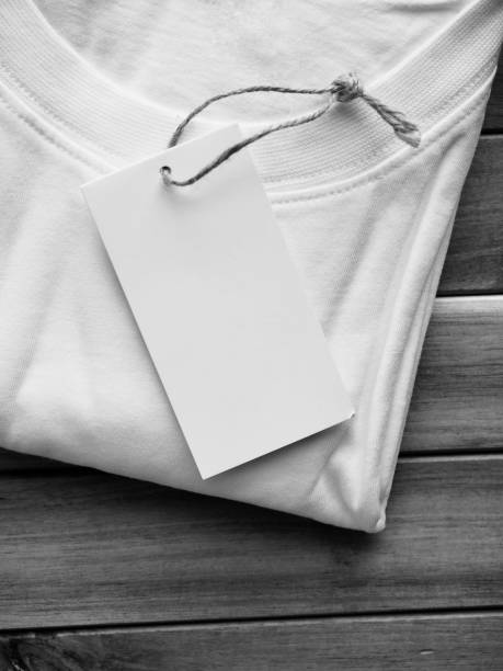White round t-shirt and clothing label stock photo