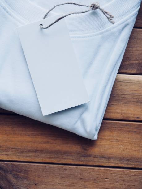 istock White round t-shirt and clothing label 955894658