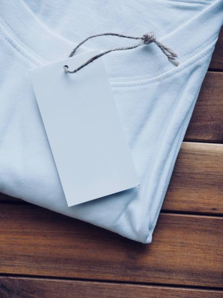 istock White round t-shirt and clothing label 955894666