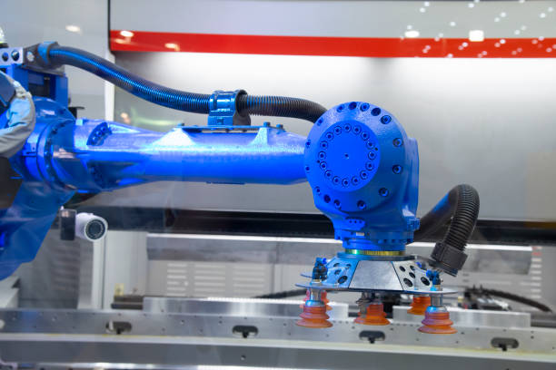 istock The robot for metal handing sheet metal in forming process . 955894814