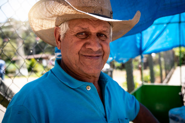 istock Senior farmer/countryside man 955898250