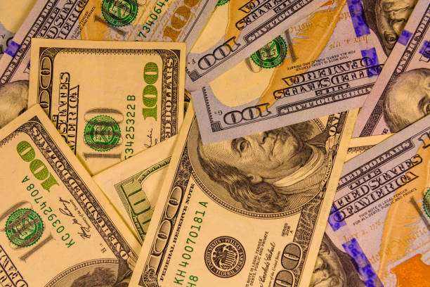 istock Background of the many one hundred dollar bills 955899978