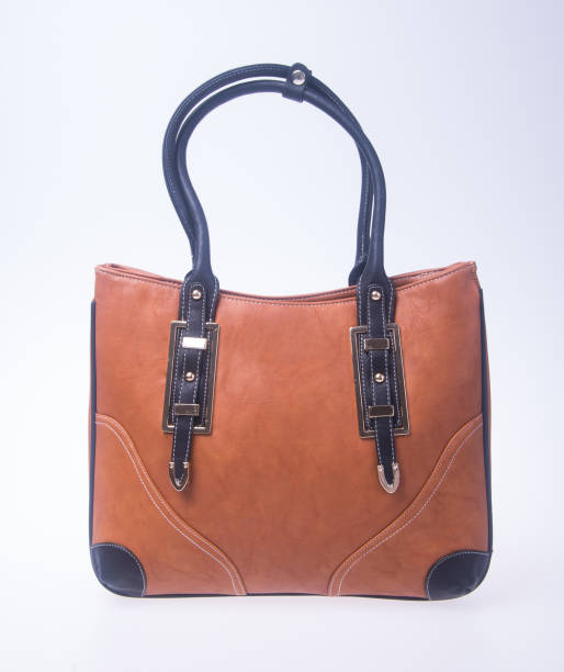 istock woman handbag on a background 955906578