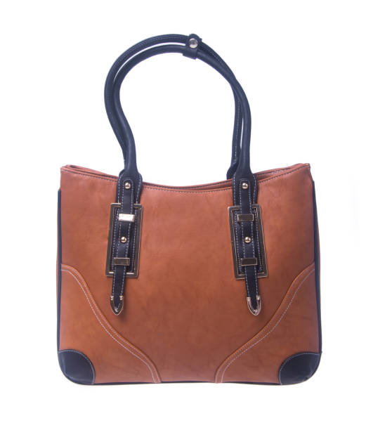istock woman handbag on a background 955906616