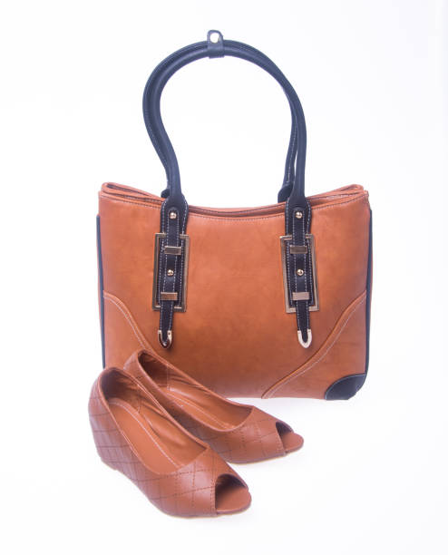 istock women bag and fashion shoe on a background 955906708