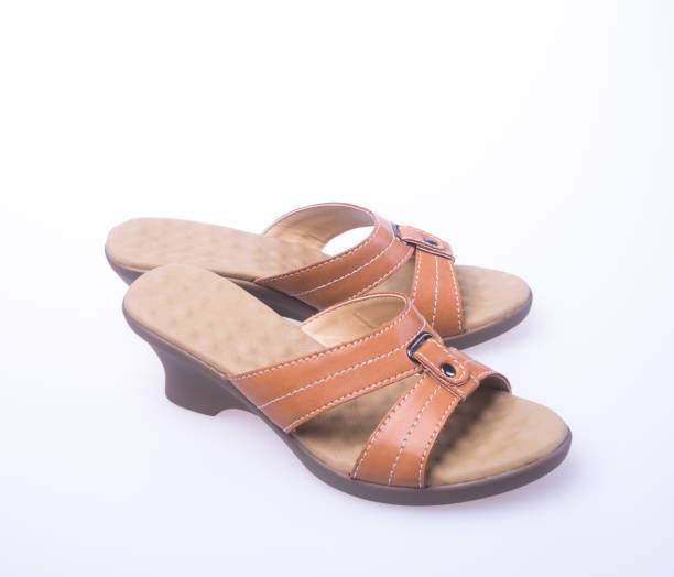 istock woman shoes on a background 955906892