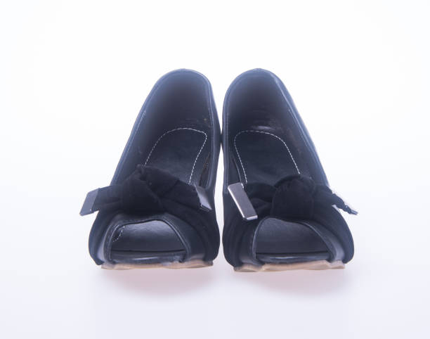 istock woman shoes on a background 955906928
