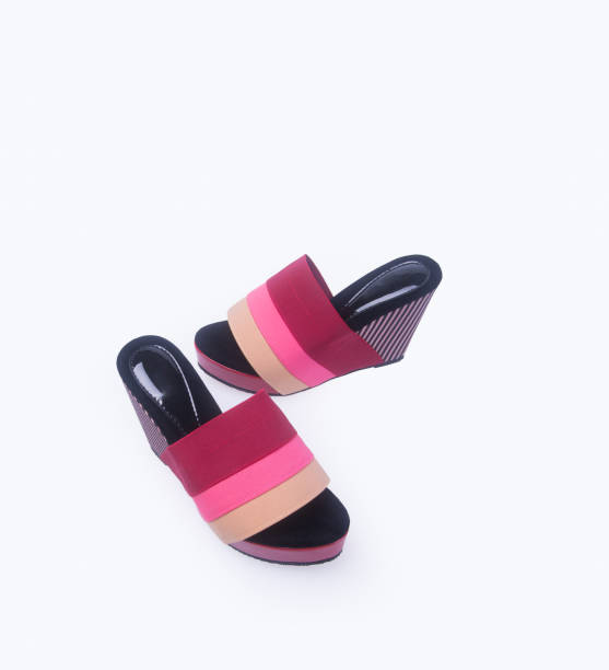 istock woman shoes on a background 955907372