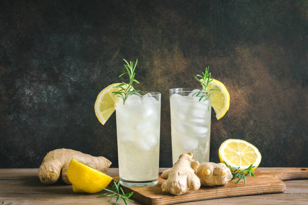 Ginger Ale Ginger Ale - Homemade lemon and ginger organic soda drink, copy space. ginger spice stock pictures, royalty-free photos & images