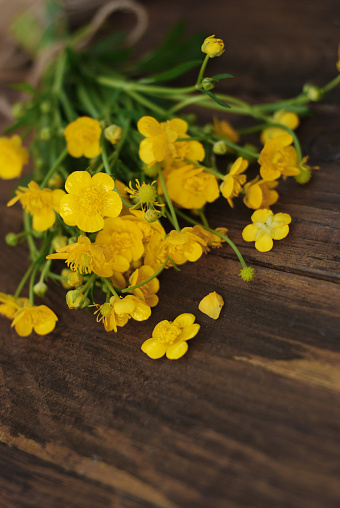 Yellow Little Flowers Bouquet gift Spring time Rustic Wooden Backgroundf
