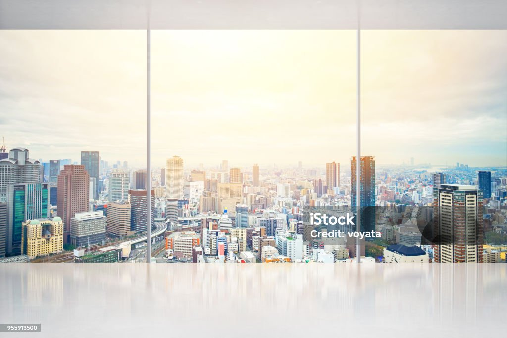 empty concrete ground and window with japan skyline for display or mock up Business and design concept - empty concrete ground and window with panoramic modern urban skyline bird eye aerial day view of Osaka, Japan, for display or mock up Window Stock Photo