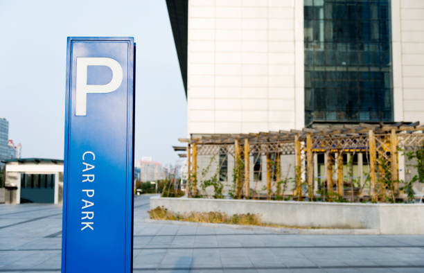 istock A blue parking sign beside the road 955916512