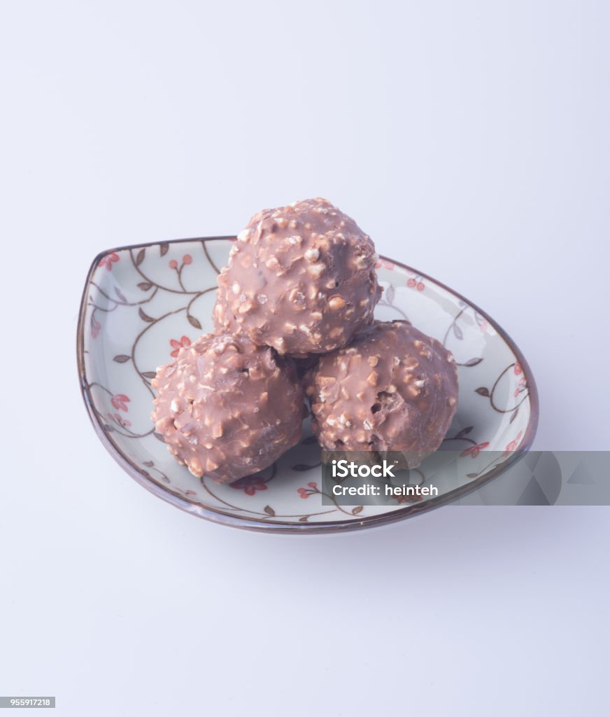 chocolate ball chocolate ball or chocolate bonbon on a background Black Color Stock Photo