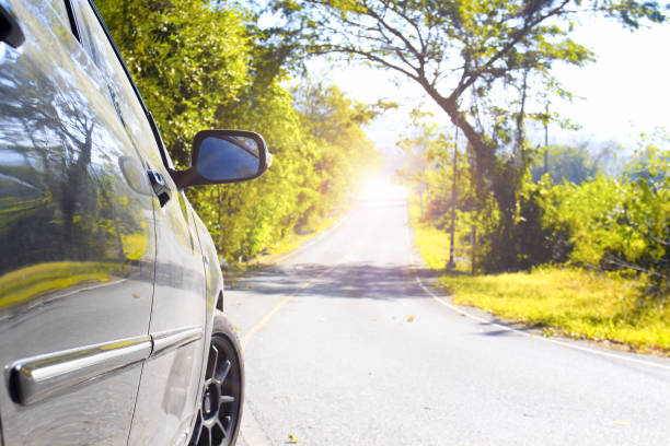 istock Travel car on road trip 955926410