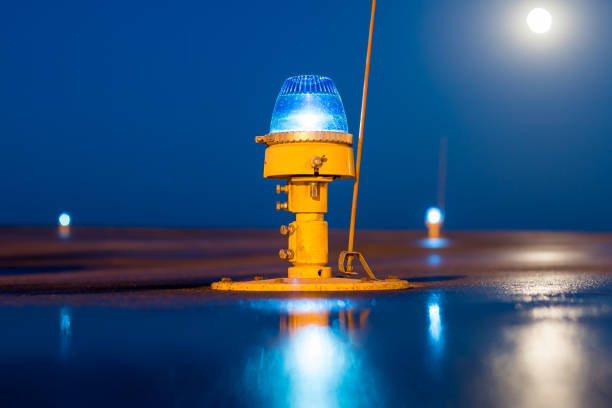 Taxiway, side row lights at the night airport Taxiway, side row lights at the night airport taxiway stock pictures, royalty-free photos & images