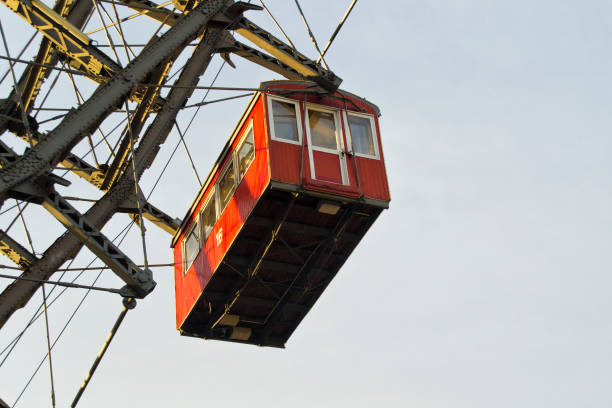 vienna prater park amusement giant wheel with red cabins.