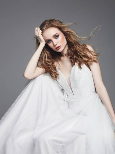 istock Beautiful bride in wedding dress 955933038