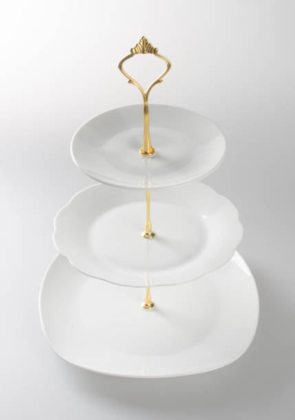 istock tray or three tier serving tray on a background 955938550
