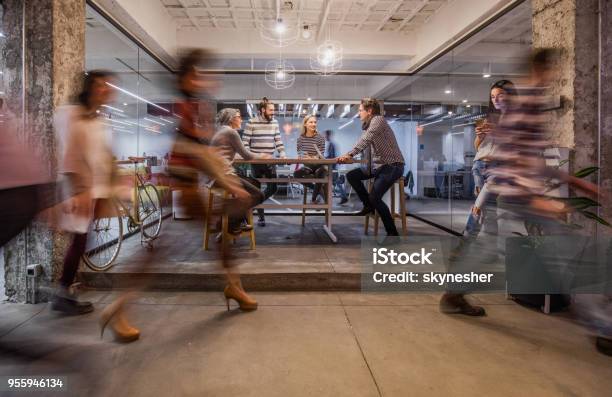 Business Meeting At Busy Corporate Office Stock Photo - Download Image Now - Office, Busy, Motion