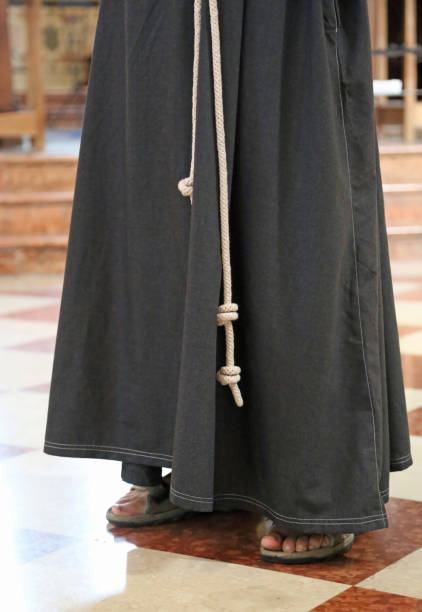 istock monk with sandals in the church 955948052