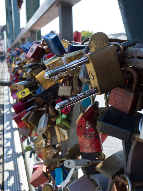 istock Close up of iron love locks on a bridge 955948100