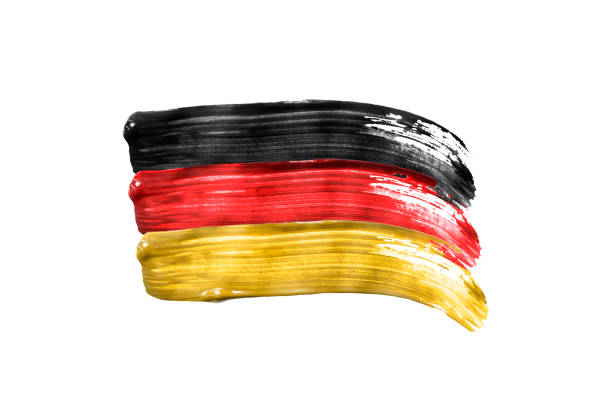 Paint brush strokes in colors of german national flag isolated over white