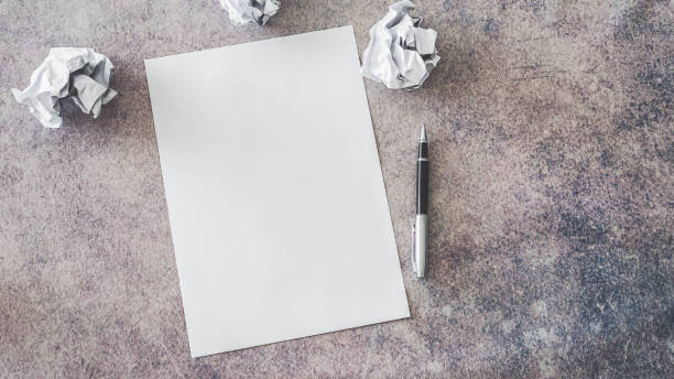 istock Empty paper with crumpled paper balls 955953302