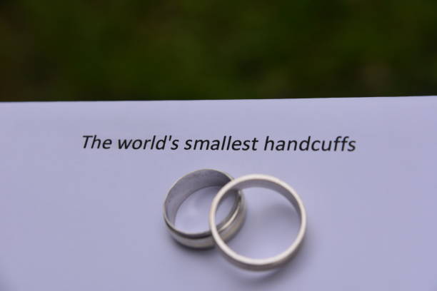 istock The world's smallest handcuffs 955959554
